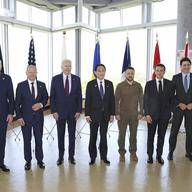 President Joe Biden, fourth from left, and Ukrainian President Volodymyr Zelenskyy, fifth from right, and other G7 leaders pose for a photo before a working session on Ukraine during the G7 Summit in