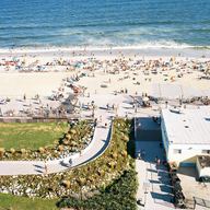 People on the beach on a sunny day.