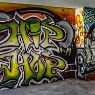 A mural at the birthplace of Hip Hop at Bronx's Sedgwick Houses, features an image of the genre's creator DJ Kool Herc, Wednesday July 26, 2023, in New York.
