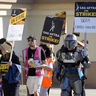 Striking SAG-AFTRA members take part in a picket line outside Paramount Pictures studio, Friday, Nov. 3, 2023, in Los Angeles.