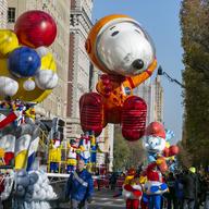 The Astronaut Snoopy balloon is on Central Park West in New York City during Macy's Thanksgiving Day Parade on Thursday, Nov. 24, 2022.