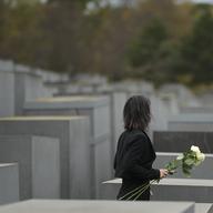 German Foreign Minister Annalena Baerbock places flowers at The Memorial to the Murdered Jews of Europe, known as Holocaust Memorial to commemorate on the 85th anniversary of the November 1938 progrom