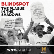 Protesters holding up signs during the height of the AIDS crisis