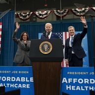 From left, Vice President Kamala Harris, President Joe Biden and Democratic North Carolina Governor Roy Cooper wave to and address the audience during campaign event in Raleigh, N.C., Tuesday, March 2
