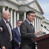 Speaker of the House Mike Johnson, R-La., joined at left by Sen. Mike Lee, R-Utah, Rep. Chip Roy, R-Texas, talks to reporters about requiring American citizenship to vote in national elections, 