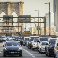 Traffic enters lower Manhattan after crossing the Brooklyn Bridge, Thursday, Feb. 8, 2024, in New York. 