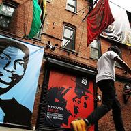 Memorials for 43-year-old Eric Garner (left), killed in an encounter with police on Staten Island on July 17, 2014,  and 18-year-old Michael Brown, killed by police in Ferguson, Missouri, on Aug. 9, 2