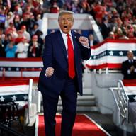 Republican presidential nominee, former President Donald Trump dances off stage at the conclusion of a campaign rally at the J.S. Dorton Arena on November 04, 2024 in Raleigh, North Carolina.
