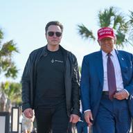 U.S. President-elect Donald Trump greets Elon Musk as he arrives to attend a viewing of the launch of the sixth test flight of the SpaceX Starship rocket on November 19, 2024 in Brownsville, Texas.