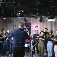 Queens College Vocal Ensemble, led by James John, performs Pete M. Wyer's 'Street Motet No. 1'