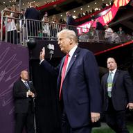  U.S. President Donald Trump walks onto the field prior to Super Bowl LIX between the Kansas City Chiefs and the Philadelphia Eagles at Caesars Superdome on February 09, 2025 in New Orleans, Louisiana