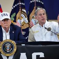 President Donald Trump and Texas Governor Greg Abbott participate in a round table event at the Hill Country Youth Event Center to discuss last week's flash flooding on July 11, 2025 in Kerrville, Tx.