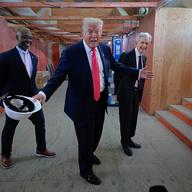  U.S. Sen. Tim Scott (R-SC), President Donald Trump and Federal Reserve Chair Jerome Powell tour the Federal Reserve’s $2.5 billion headquarters renovation project on July 24, 2025 in Washington, DC. 