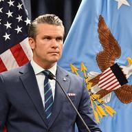 US Secretary of Defense Pete Hegseth looks on during a joint press conference with Admiral Charles Bradford 'Brad' Cooper II, Commander of US Central Command, at US Central Command (CENTCOM) headquart