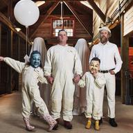 The band Modest Mouse posing for a promotional photo for their upcoming album.