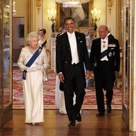 Queen Elizabeth II (L) arrives with U.S. President Barack Obama, his wife Michelle Obama and Prince Philip, Duke of Edinburgh (R) in the Music Room of Buckingham Palace ahead of a State Banquet on May