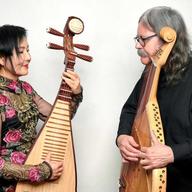  Min Xiao-Fen and Julian Kytasty, posing with their instruments, pipa and bandura.