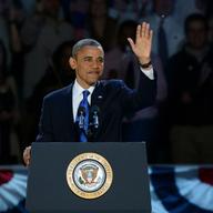 US President Barack Obama arrive on stage after winning the 2012 US presidential election November 7, 2012 in Chicago, Illinois. 