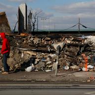 Damaged street where 17 buildings burned down on Rockaway Beach Boulevard in the Rockaways.