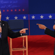 US President Barack Obama and Republican Presidential nominee Mitt Romney debate on October 16, 2012 at Hofstra University in Hempstead, New York.