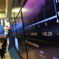 Following news that Standard and Poor's had cut its long-term outlook on U.S. debt to negative, the Dow Jones industrial average (INDU) fell 180 points