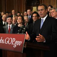 Flanked by House GOP members, U.S. Speaker of the House Rep. John Boehner (R-OH) speaks during a media availability December 20, 2011 on Capitol Hill in Washington, DC