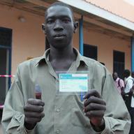 A man registers to vote in Sudan.