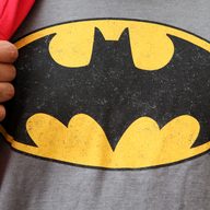 Fans outside the 34th Street AMC Lowes Theater on 34th Street line up for opening night of 'The Dark Knight Rises.' Batman