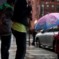 Hello Kitty umbrella in the rain, rainy day,