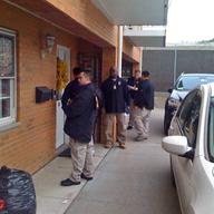 Immigration officers ring the door bell of Abe and Fatima's building