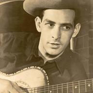 Oscar Brand with his guitar
