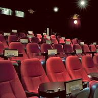 There's no free dishware, but Nighthawk Cinema features dinner and a movie all under the same roof.