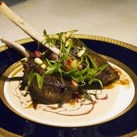 The 'Spoils' dinner served on looted Saddam Hussein plates. 