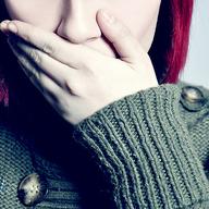Hand covering mouth