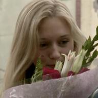 girl smells flowers