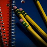 Notebooks and Pencils