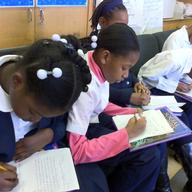 Students of P.S. 269 composing their stories about the Haiti earthquake