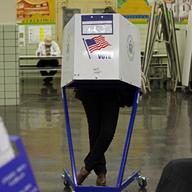 Voter filling out paper ballot on mid-term election day 2010 at P.S. 17 in Williamsburg, Brooklyn