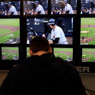 Michael O'Hara watching the opening game in his "fan cave."