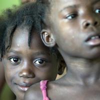 Children wait in line for medical care in Haiti