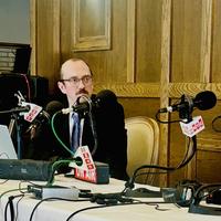 Sean Carlson and guests in conversation during broadcast
