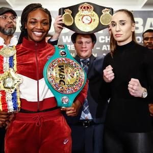 Claressa Shields (left) weighing in against Ivana Habazin (right) ahead of their welterweight champion fight in Atlantic City.