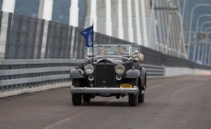 Governor Andrew Cuomo drives FDR's Packard across the east-bound span of the newly completed Mario Cuomo Bridge for an opening day celebration.