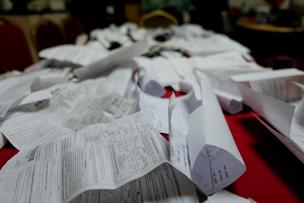 A pile of e-bike related violations at a Fujianese community association where deliver workers go for assistance.