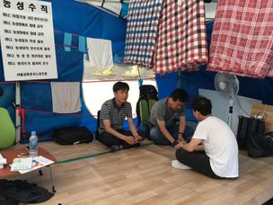 Seoul Metro workers take turns staying in this tent, hoping to send a message to the company that they are against running driverless trains and stations without station agents wo