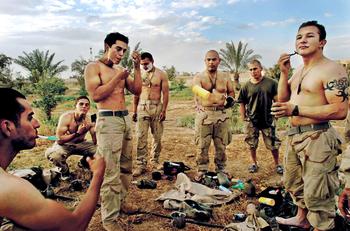Tikrit April 15, 2003 - US Marines take a break to shave in front of one of Saddam Hussein’s presidential palaces the day Tikrit fell from Republican Guard rule. 