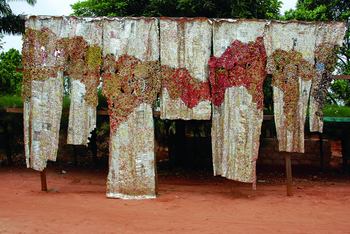 El Anatsui, Drifting Continents, 2009. Photographed by El Anatsui in front of his studio in Nsukka, Nigeria.