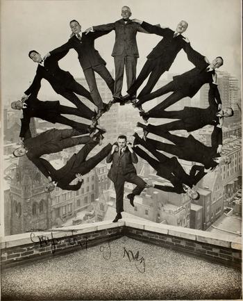 Unidentified American artist. Man on Rooftop with Eleven Men in Formation on His Shoulders