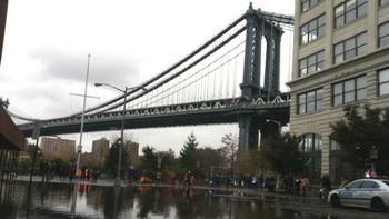 Workers began cleaning the streets of Dumbo in the aftermath of Hurricane Sandy