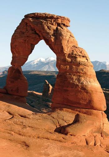 Delicate Arch at sunset in Arches National Park outside Moab, Utah.